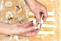 Blueberry Knots at home baking kit featuring vegan braided pastry knots filled with blueberry, perfect for gifting or a fun night in.