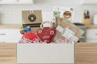 Box includes;
One full size bag dog treats,
One Chew Toy
One Plush/Rope/Ball
One themed gift for the human 
