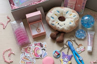 scoop box, curated gift box, personal care package,  jelly cat, needoh, squeeze toy, hello kitty, slime