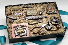 Gift box with chocolate fishing accessories, fish-shaped chocolates, and bars decorated with fishing-themed images
