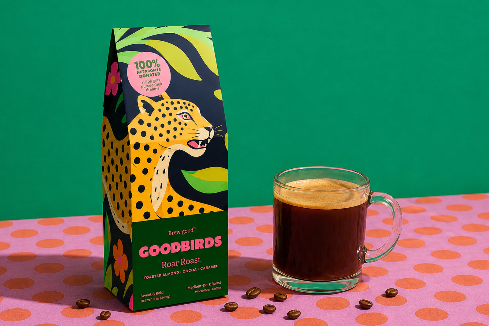 Two bags of coffee, a Goodbirds box and a cup of coffee, part of Goodbirds monthly coffee subscription of 2 12oz bags of coffee