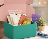 Open Senior Joy Welcome Box showing cozy self-care gifts, teas, and keepsakes curated for senior women.