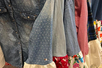 Upcycled blouses are handsewn and have sleeves made from vintage doilies, table clothes and curtains.  