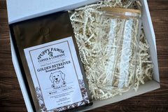 Box includes: 
one full-size  12oz bag of coffee , 
a themed lagniappe gift for the human 
and a sample treat for your furry friend