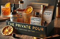 Premium Old Fashioned cocktail kit, bitters, syrup, garnishes, and a recipe card in an elegant gift.
