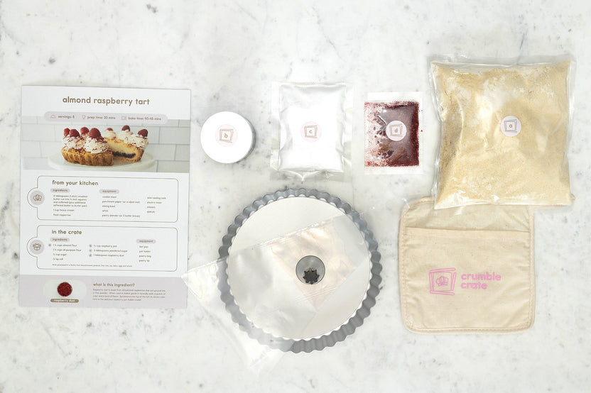 Almond Raspberry Tart DIY Baking Kit with pre-measured ingredients, tart pan, and step-by-step instructions