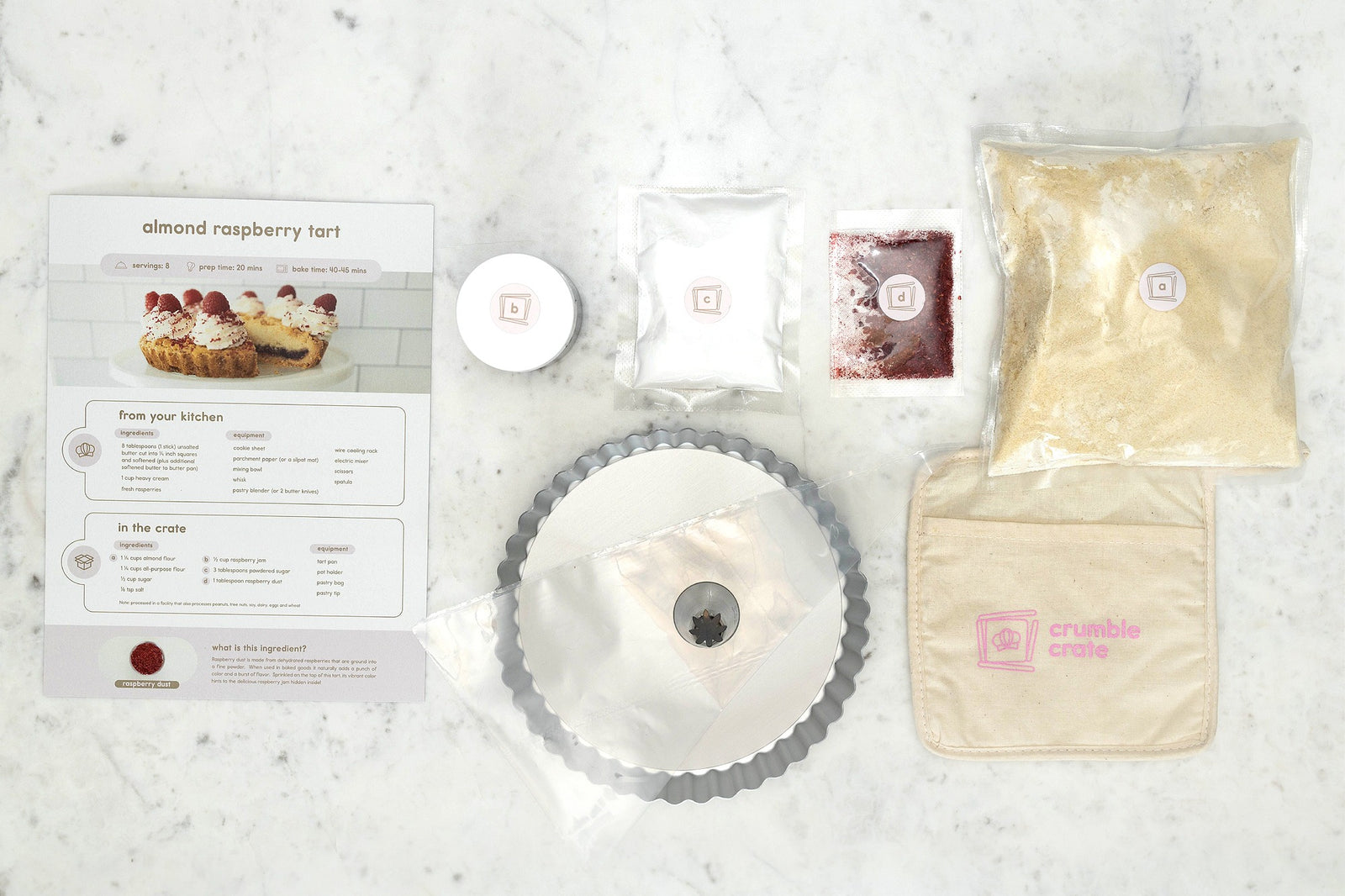 Almond Raspberry Tart DIY Baking Kit with pre-measured ingredients, tart pan, and step-by-step instructions