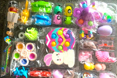 Fidget Toy Advent Calendar with Mochis, bubble pop its, infinity cubes, spring fidgets, keychain toys, squish balls, puzzle fidgets