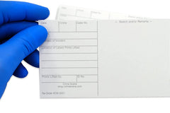 We see a basic latent fingerprint kit with brush powder and tape to lift latent fingerprints from surfaces