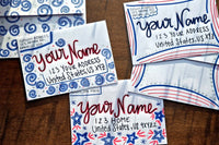 Three hand-decorated patriotic envelopes with red, white and blue designs, handwritten sample names and U.S. addresses.