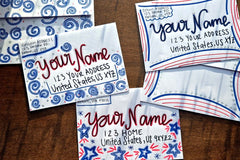 Three hand-decorated patriotic envelopes with red, white and blue designs, handwritten sample names and U.S. addresses.