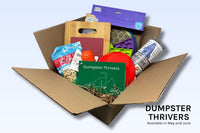 A Dumpster Thrivers Discovery Kit includes two food puzzles, two types of treats, a scratch board, and agility cones.