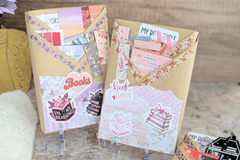 surprise book box with new book, annotation supplies, relaxation and self care items packaged neatly in a box