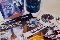 Curated astronomy subscription box featuring space gifts, galaxy-themed collectibles, accessories, and educational surprises.