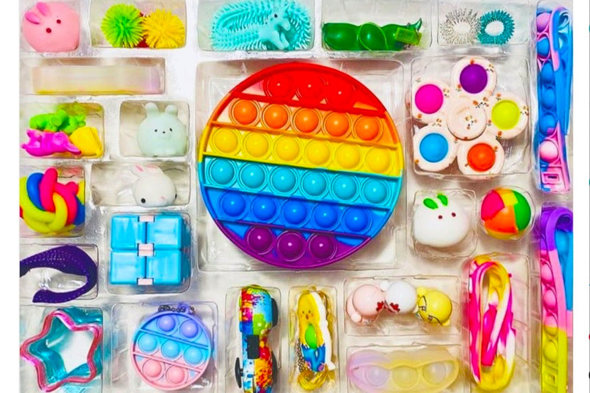 Fidget Toy Advent Calendar with Mochis, bubble pop its, infinity cubes, spring fidgets, keychain toys, squish balls, puzzle fidgets