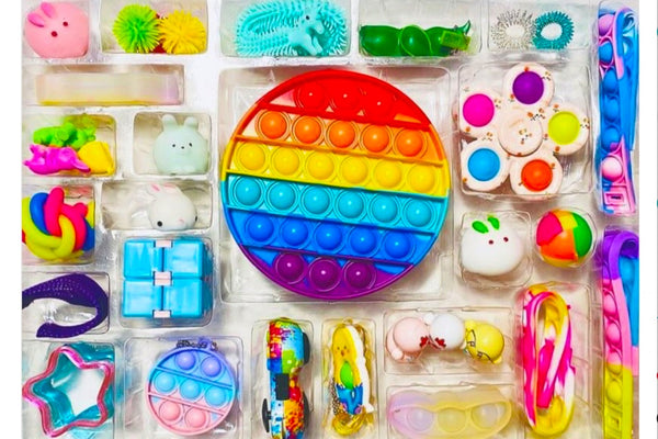 Fidget Toy Advent Calendar with Mochis, bubble pop its, infinity cubes, spring fidgets, keychain toys, squish balls, puzzle fidgets