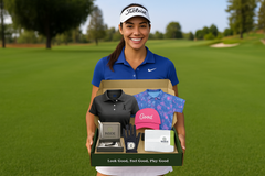Female Golfer displays Cratejoy subscription box with polo, floral shirt, glove, rangefinder tees, & accessories. The perfect golf gift!