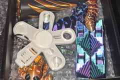 Another fan favorite is the 6 In 1 fidget spinner star.  This bad boy has just about every cool fidget idea all in one fidget!