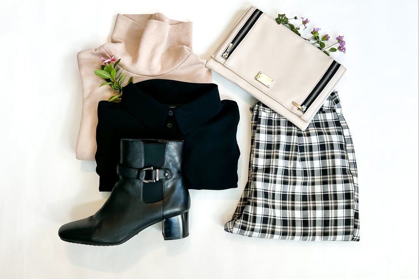 a flat lay of turtlenecks, black boots, a plaid pant and leather clutch, perfect to wear in the fall