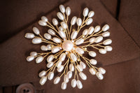 A pearl is a living jewelry. Handcrafted freshwater pearl brooch pendant. The 2025 trend for unique style. Say yes to one of a kind.