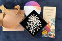 A pearl is a living jewelry. Handcrafted freshwater pearl brooch pendant. The 2025 trend for unique style. Say yes to one of a kind.
