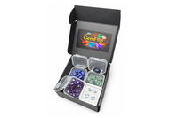 GemFlip premium black box opened vertically, revealing natural rough gemstones and faceted stones stored in transparent cases, designed for 