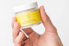 Vegan Facial Clay Mask: "Container of natural clay facial mask, part of the all-natural bath and body gift collection."
