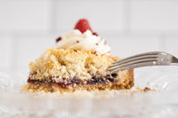 Almond Raspberry Tart DIY Baking Kit with pre-measured ingredients, tart pan, and step-by-step instructions