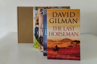 Brown box filled with fiction books, showcasing a variety of gripping titles and intriguing covers, perfect for mystery lovers.