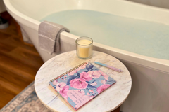 Promise Keeper Christian journal planner subscription bathtub candle relaxing marble table in bathroom 
