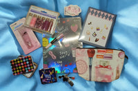 Makeup Magick Stationery Set. Includes journal, pencil case, correction tape, pen, erasers, glitter, tin box, crams, sticky notes, mirror.