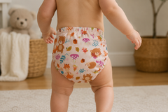 Baby walking wearing bear and fox cloth diaper