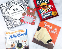 Owl Post Books kids subscription box with holiday gift titles Kick! Jump! Chop!, The Nose That Knows, and How to Eat an Airplane.