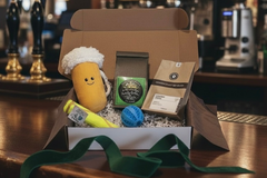 Box includes;
One full size bag dog treats,
One Chew Toy
One Plush/Rope/Ball
One themed gift for the human 
