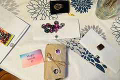 monthly tarot card pull with description, monthly crystal and its meaning, monthly Divination dice reading and mystery deck