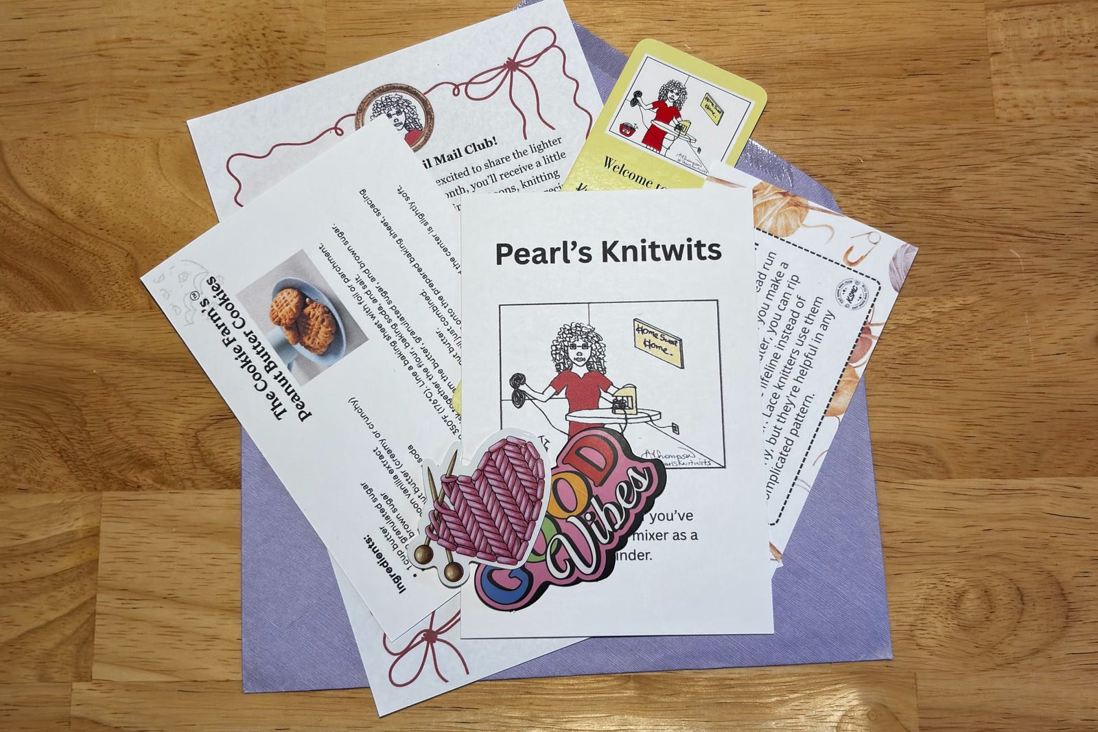 Knit Snail Mail Club monthly letters contains a knitting themed letter, knitting cartoon, cookie recipe, knitting tips and curated surprises