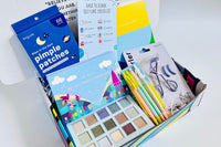 Colorful TEEN WISHBOX subscription box filled with skincare, socks, and snacks, ideal as a holiday gift for teens