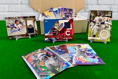 Chicago Cubs baseball cards, including autographs and game-used cards, arranged in display stands on a green carpet.