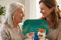 Elderly woman smiling while opening a thoughtful gift box filled with meaningful items
Senior enjoying curated comfort products