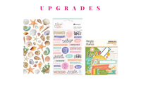 Colorful scrapbook papers and stickers in a monthly scrapbook kit featuring floral designs and cameras, ideal gifts for women