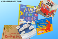 Colorful children's books featuring animals and vehicles with a Reading Bug Box subscription box for kids