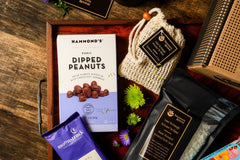 Introverts Retreat box image of a box with bath salt soaks, dark chocolate drinking cocoa and a box of dipped peanuts.