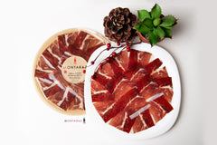 Free Range Iberico Ham Hand Carved Style by Montaraz. This plate comes in a beautiful presentation in a plastic round plate sealed vacuumed.