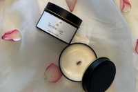 Candle in black tin