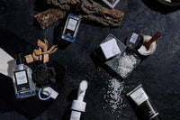 Beautiful high quality photo of a skin care and spa products for men. There is a blooming serum and many more.