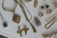 example of the boho accessories we include in our style box which will be layered metals, vintage pendants and statement accessories