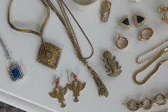 example of the boho accessories we include in our style box which will be layered metals, vintage pendants and statement accessories