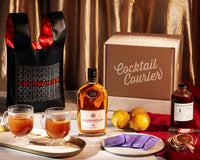 The Courvoisier Haute Toddy with COURVOISIER COGNAC VS, Ginger Honey Syrup, Black Tea and Lemons! 

