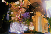 Beltane 2022 contains a beautiful triple Goddess altar tile, trio of ritual candles, anointing oil, floral crown, an altar broom + more.