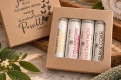 Tranquil Rose Happy Hour lip balm set featuring handcrafted flavor-inspired balms in beautiful, gift-ready packaging.